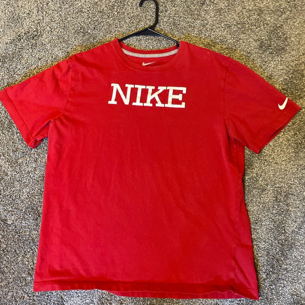 Red Nike shirt